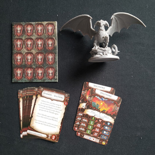 Image shows the components for the Valyndra Lieutenant Pack expansion for the board game Descent: Journeys in the Dark Second Edition