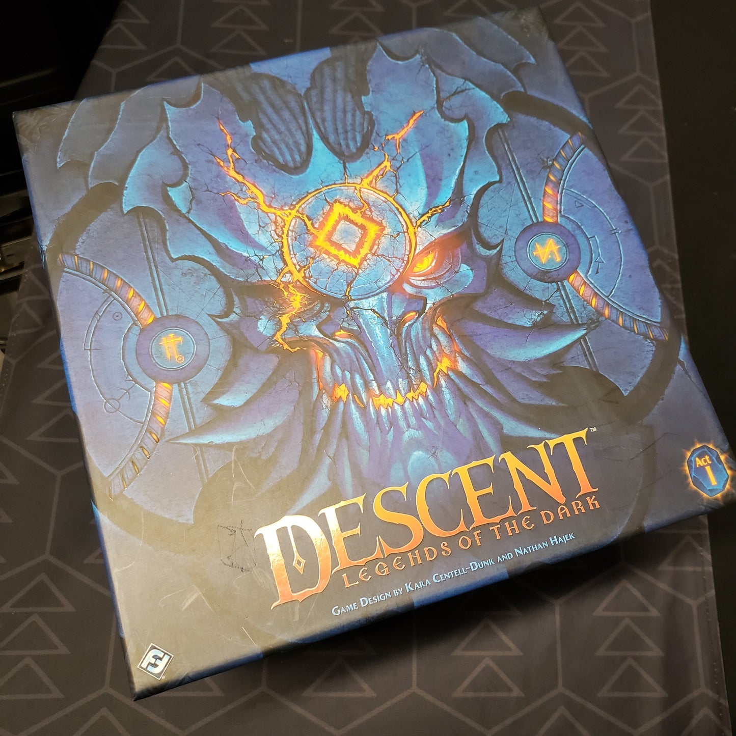 Image shows the front cover of the box of the Descent: Legends of the Dark board game