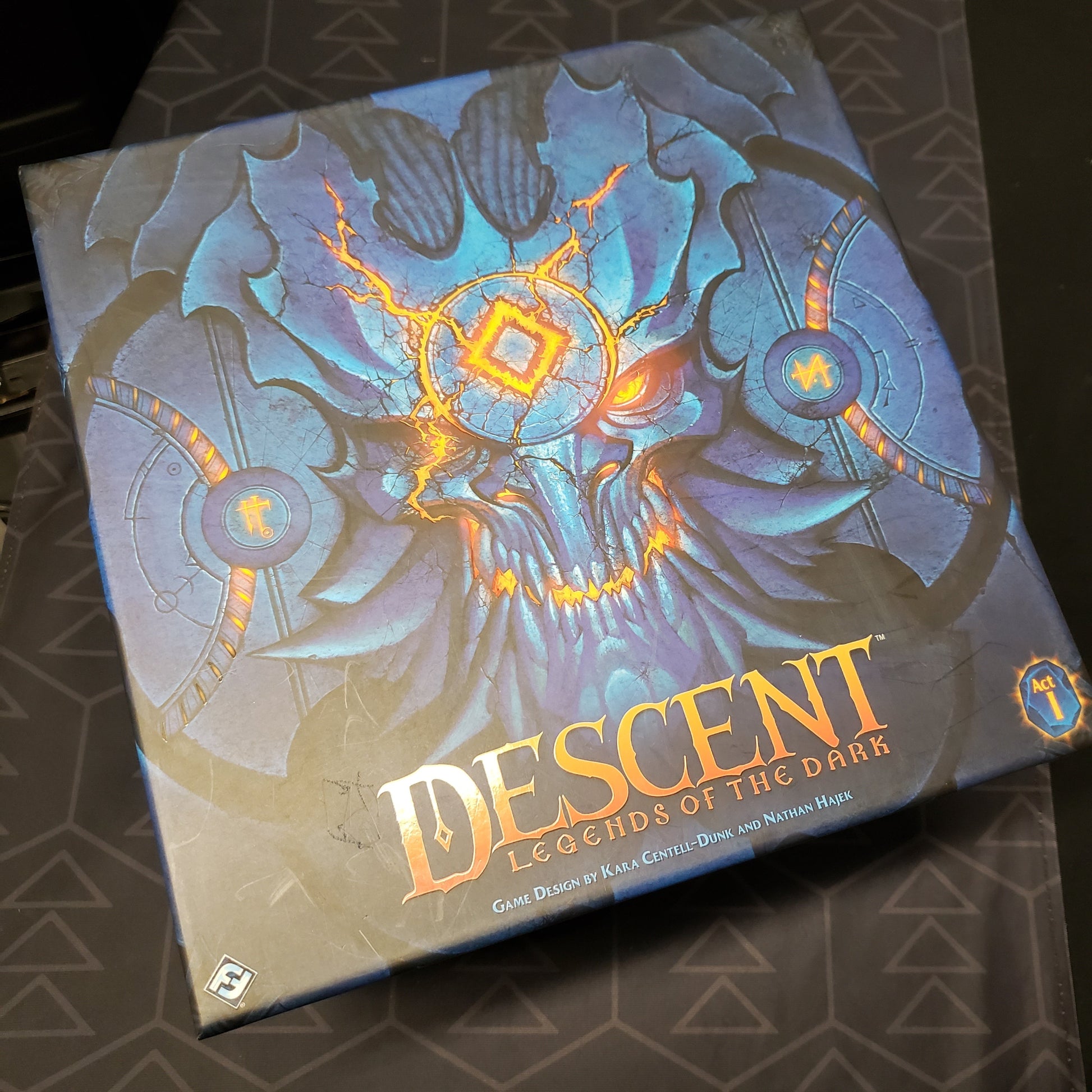 Image shows the front cover of the box of the Descent: Legends of the Dark board game