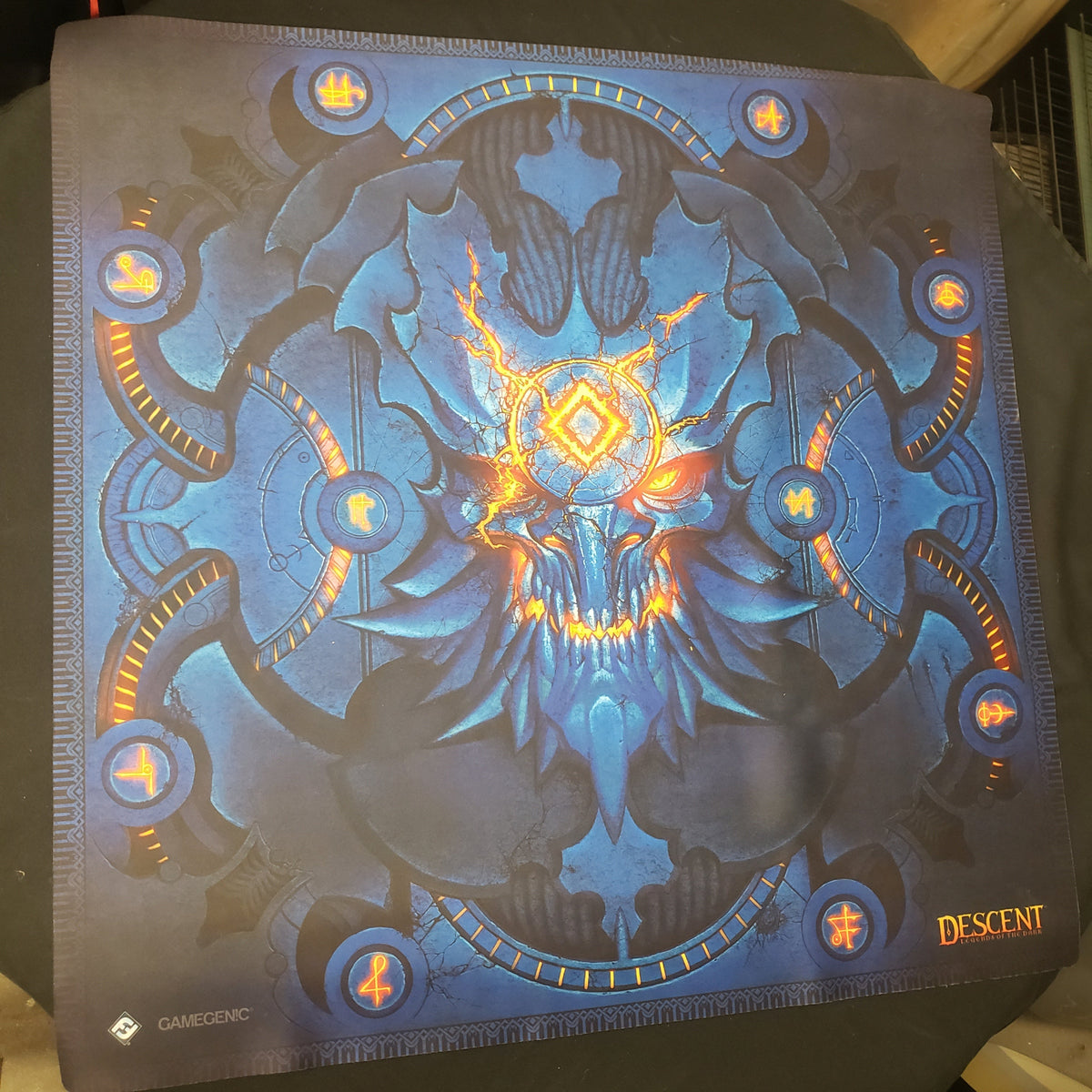 Image shows a gaming playmat featuring art from the board game Descent: Legends of the Dark