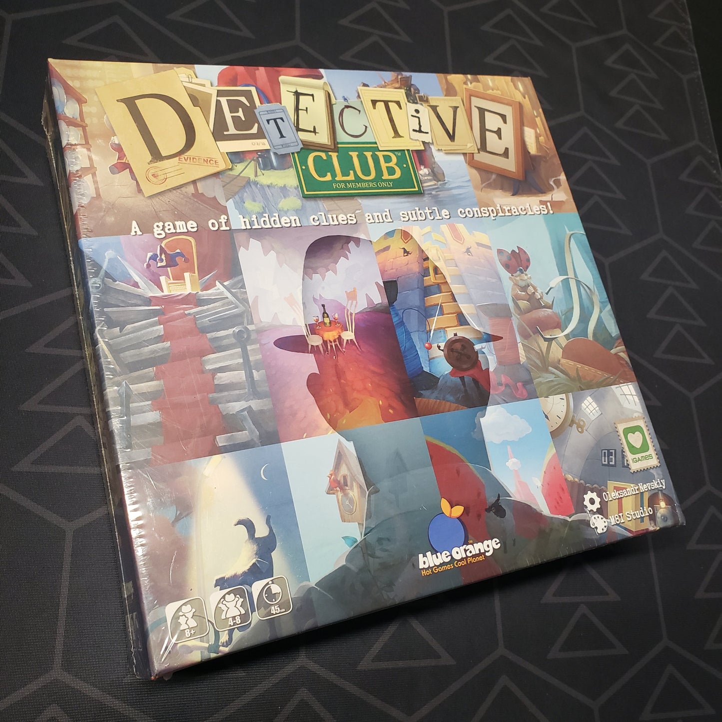 Image shows the front cover of the box for the Detective Club board game