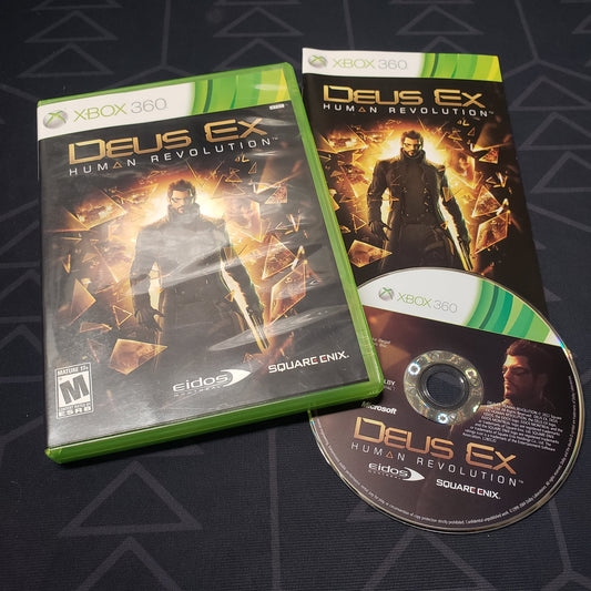 Image shows the case, manual and disc for the video game Deus Ex: Human Revolution for Xbox 360