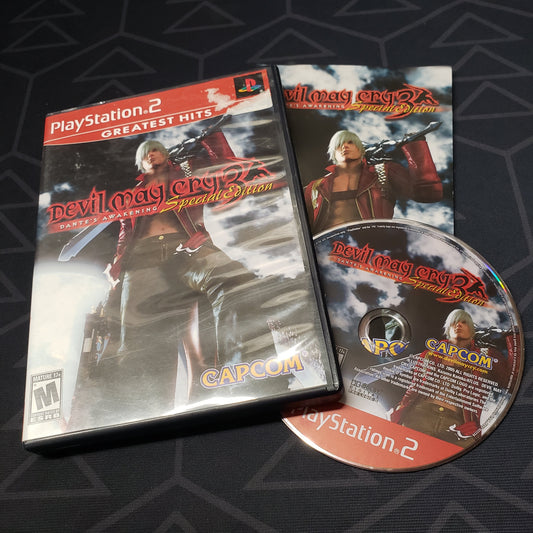 Image shows the case, manual and disc for the video game Devil May Cry 3: Dante's Awakening for Playstation 2