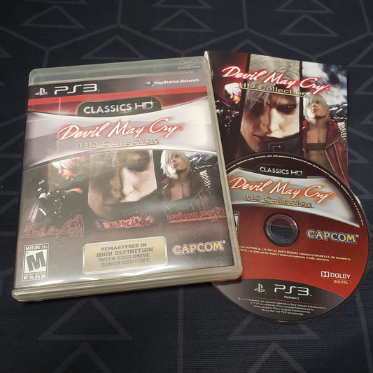 Image shows the case, manual and disc for the video game Devil May Cry HD Collection for Playstation 3
