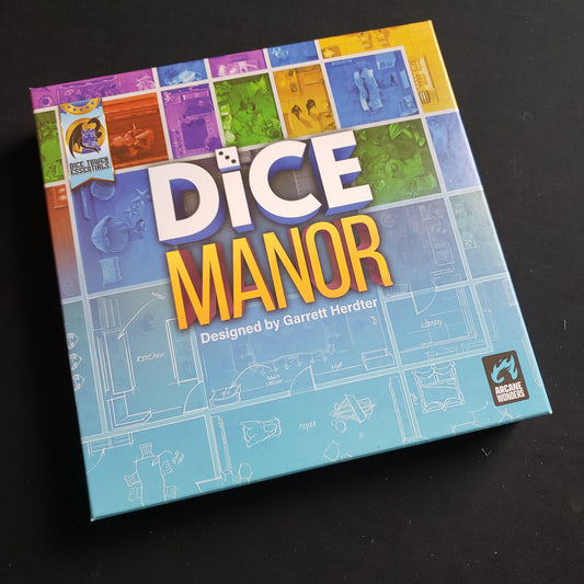 Image shows the front cover of the box of the Dice Manor board game