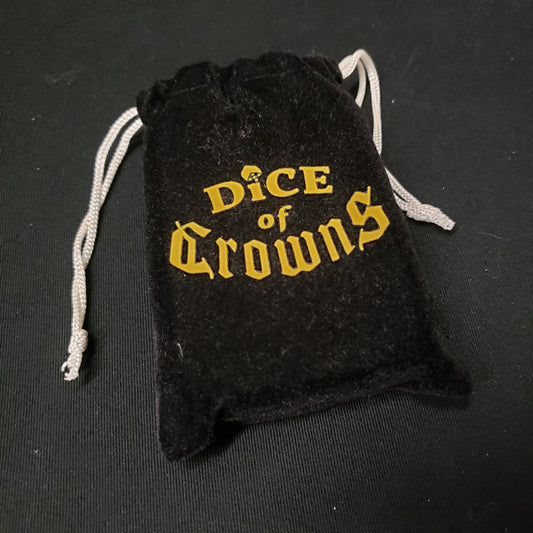 Image shows the front of the bag of the board game Dice of Crowns