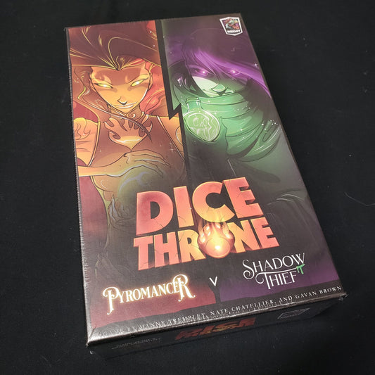 Image shows the front cover of the box of the board game Dice Throne: Pyromancer Vs. Shadow Thief