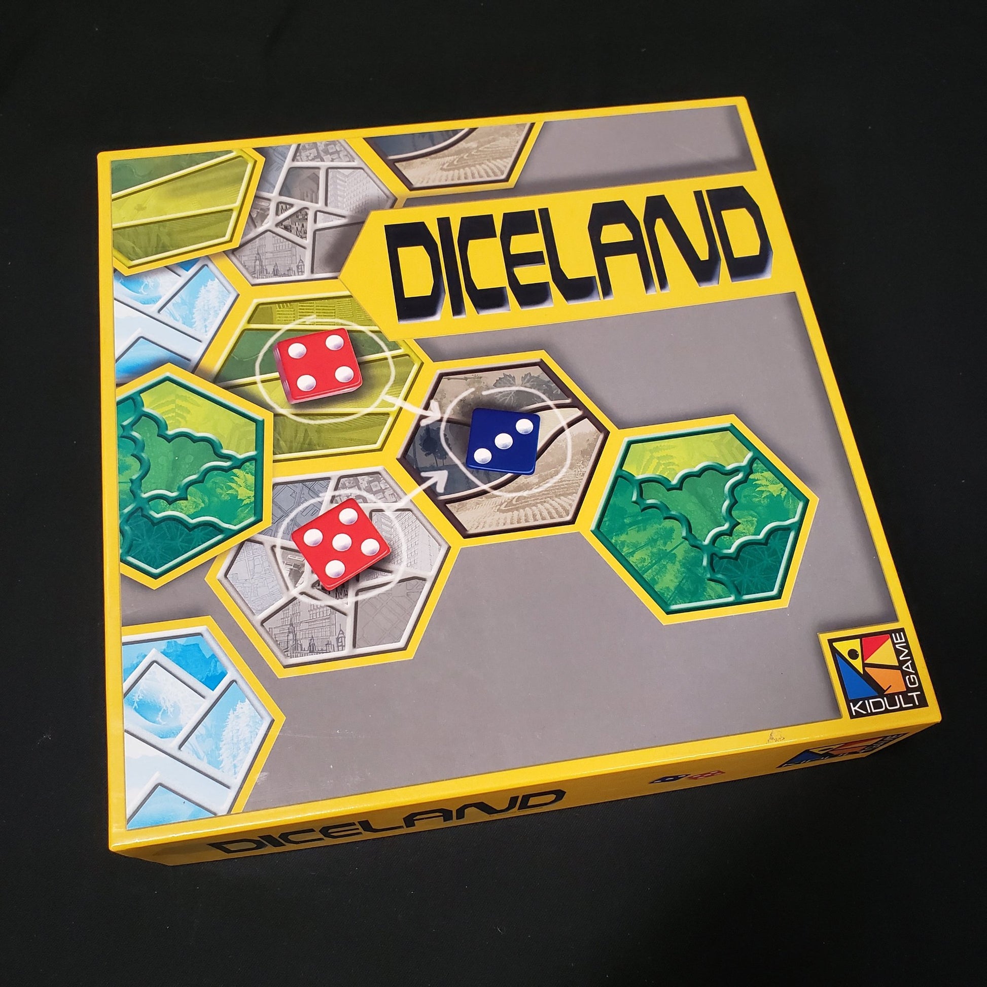 Image shows the front cover of the box of the Diceland board game