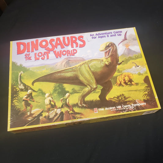 Image shows the front cover of the box of the Dinosaurs of the Lost World board game