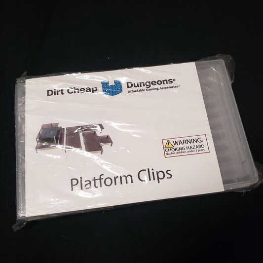 Image shows the front of the packaging of the Platform Clips set for the Dirt Cheap Dungeons modular terrain system