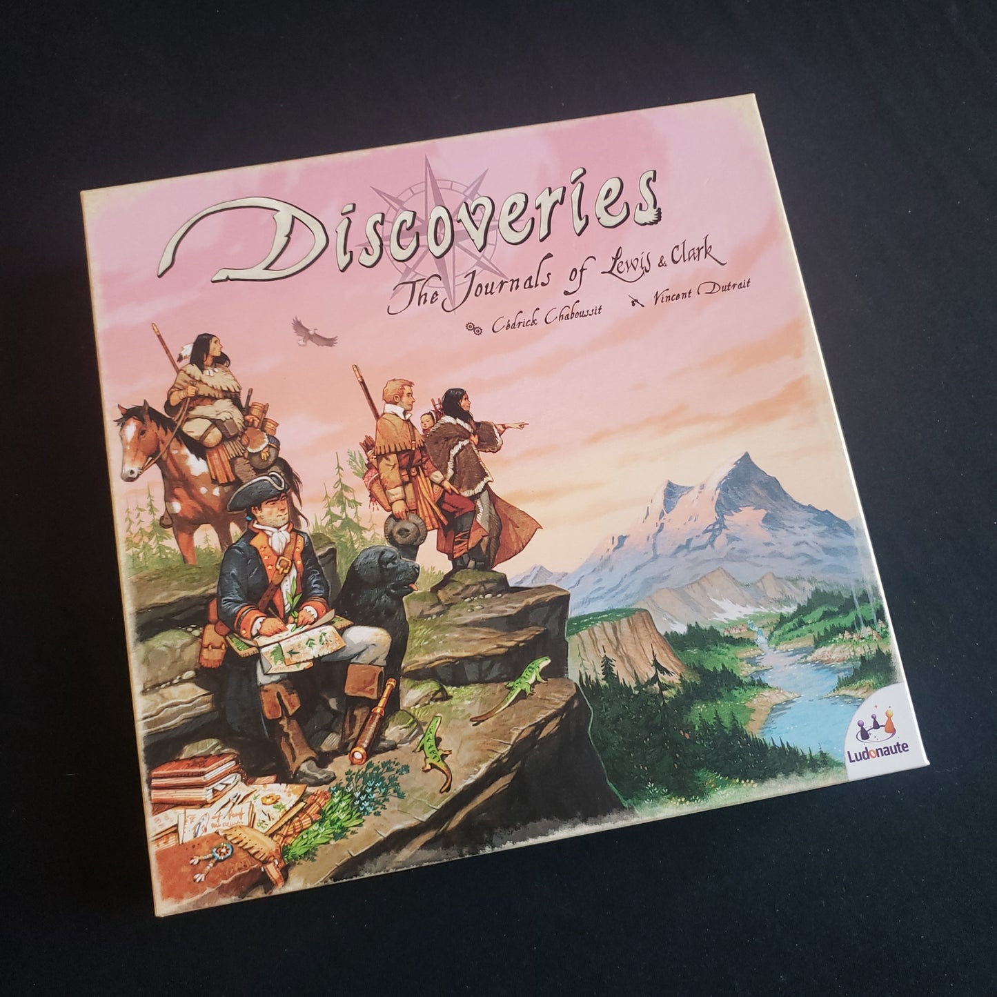 Image shows the front cover of the box of the board game Discoveries: The Journals of Lewis and Clark