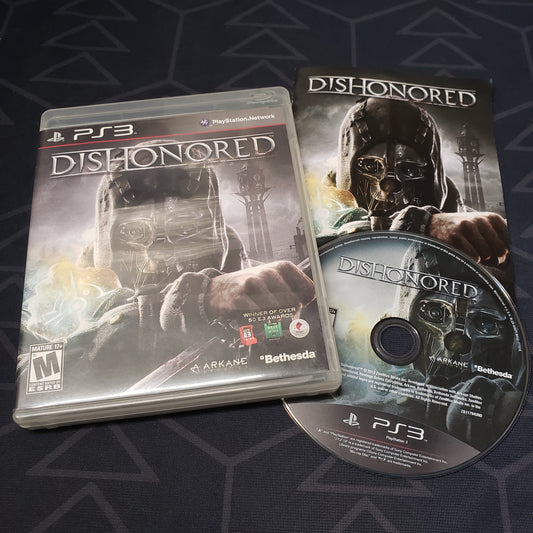 Image shows the case, manual and disc for the video game Dishonored for Playstation 3
