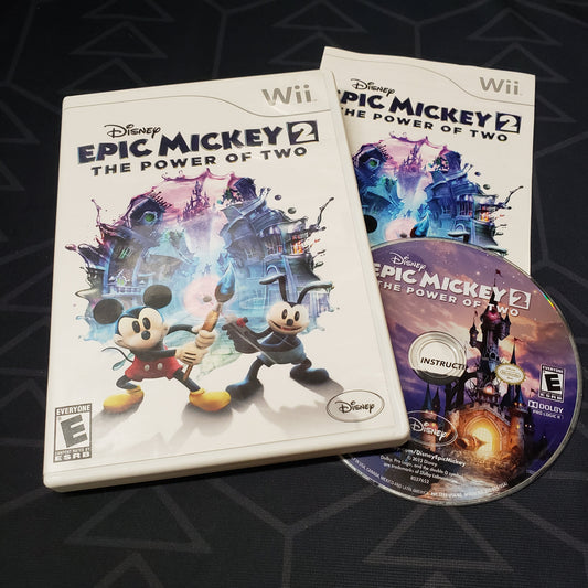 Image shows the case, manual and disc for the video game Disney Epic Mickey 2: The Power of Two for Nintendo Wii