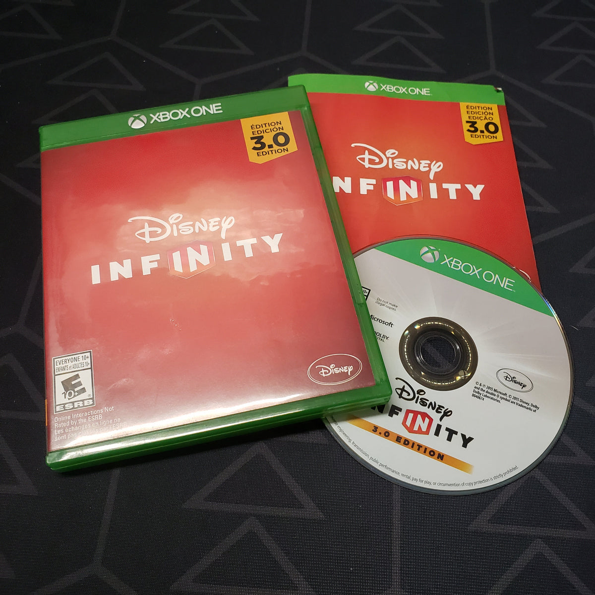 Image shows the case, manual and disc for the video game Disney Infinity 3.0 for Xbox One