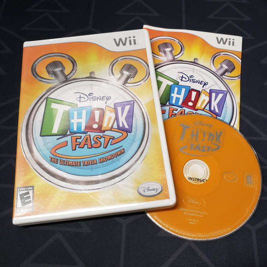 Image shows the case, manual and disc for the video game Disney Think Fast for Nintendo Wii