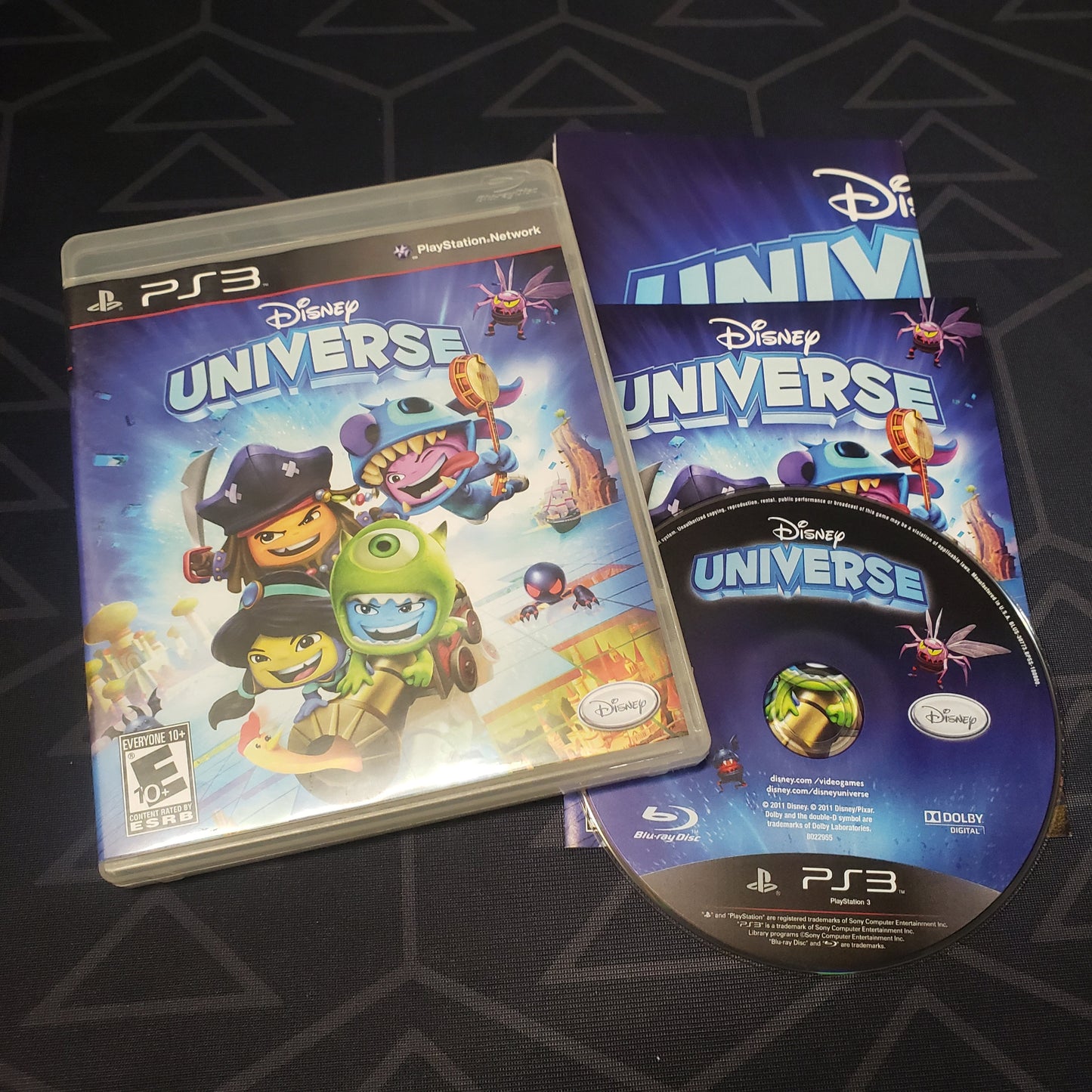 Image shows the case, manual & disc for the video game Disney Universe for Playstation 3