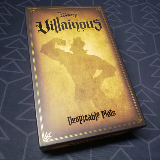 Image shows the front cover of the box for the Disney Villainous: Despicable Plots card game