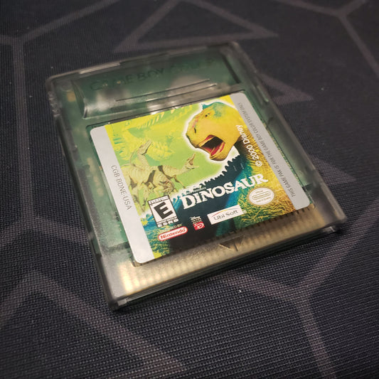 Image shows the front of the cartridge for the video game Disney's Dinosaur for Nintendo Game Boy Color