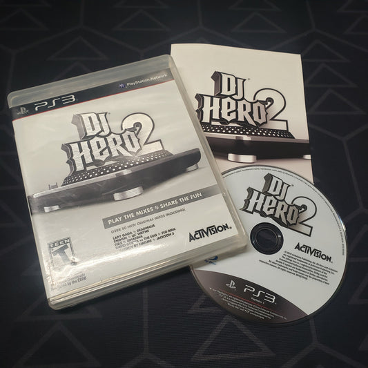 Image shows the case, manual and disc for the video game DJ Hero 2 for Playstation 3