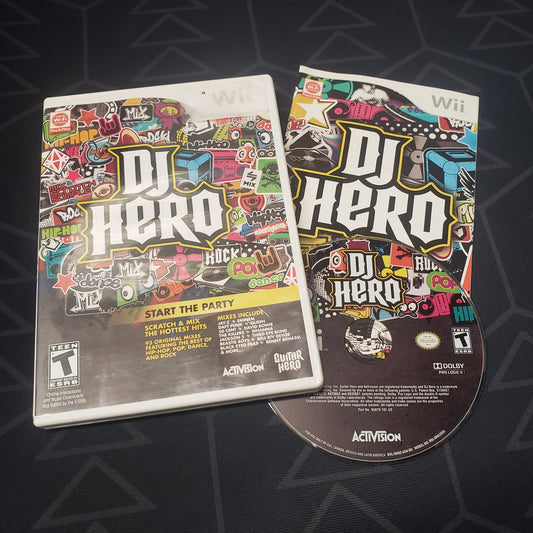 Image shows the case, manual and disc for the video game DJ Hero for Nintendo Wii