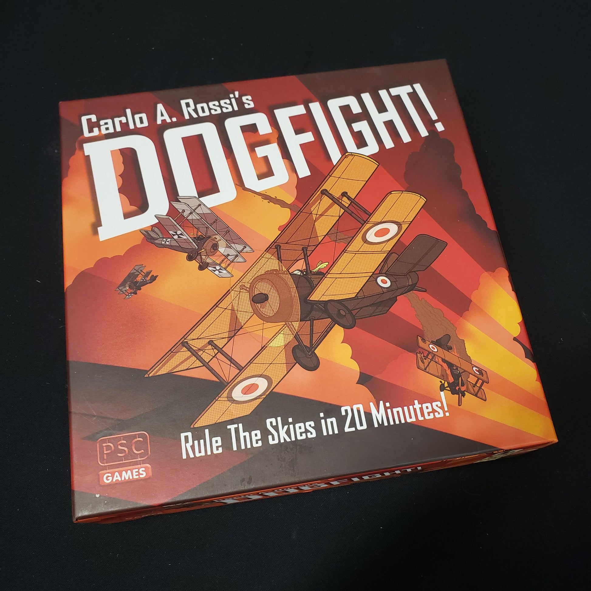 Image shows the front cover of the box of the Dogfight! board game