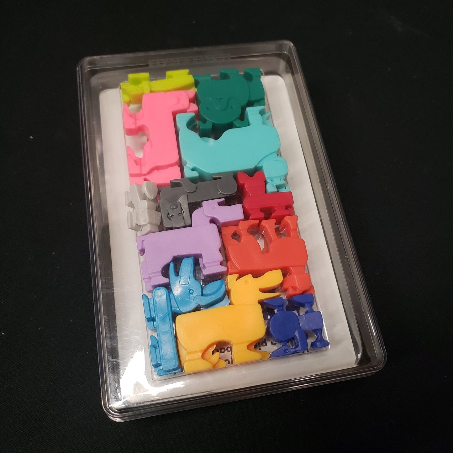 Image shows the front of the box of the dogpile puzzle game