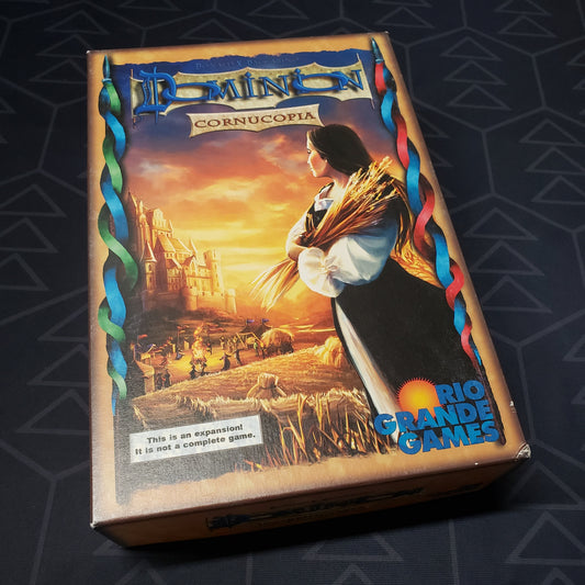 Image shows the front cover of the box of the Cornucopia expansion for the card game Dominion