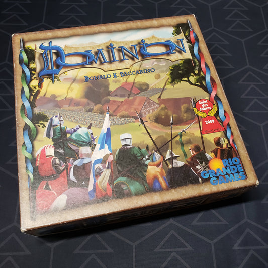 Image shows the front cover of the box for the Dominion (First Edition) card game