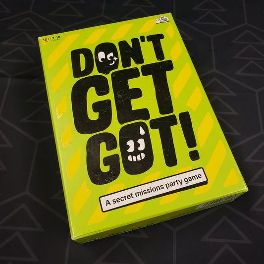 Image shows the front cover of the box of the Don't Get Got! party game