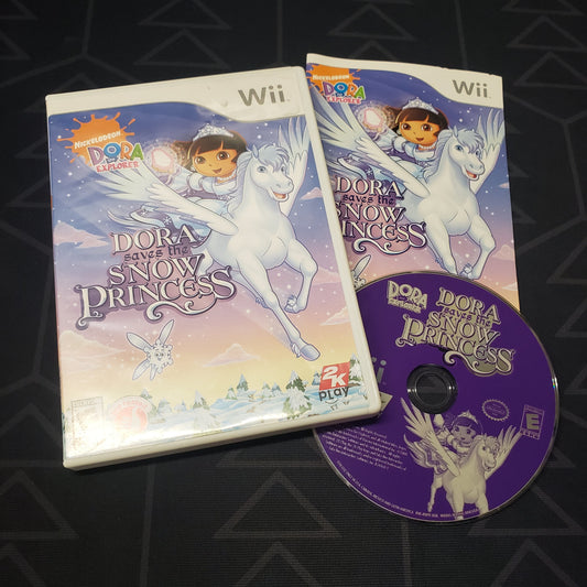 Image shows the case, manual and disc for the video game Dora the Explorer: Dora Saves the Snow Princess for Nintendo Wii
