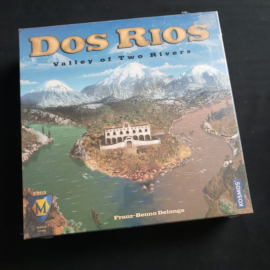 Image shows the front cover of the box of the Dos Rios board game
