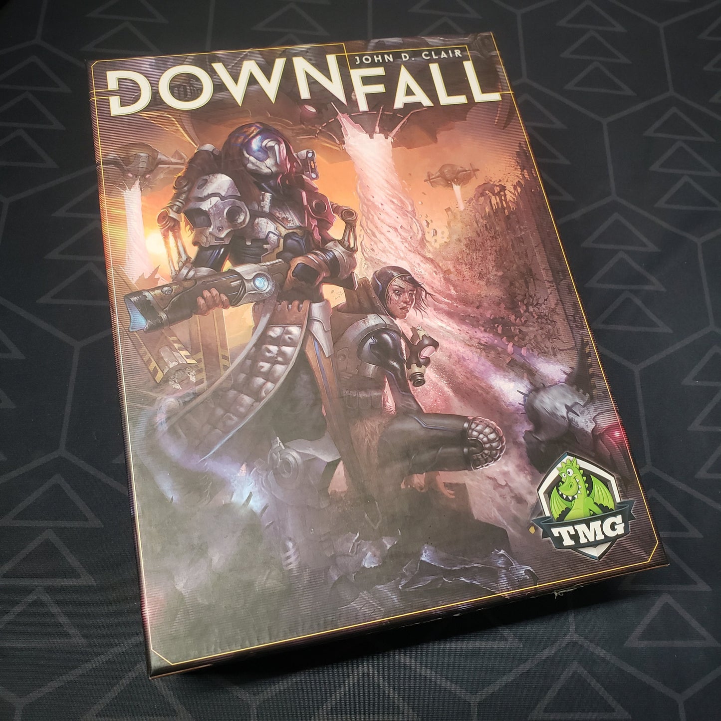 Image shows the front cover of the box for the Downfall (Retail Edition) board game