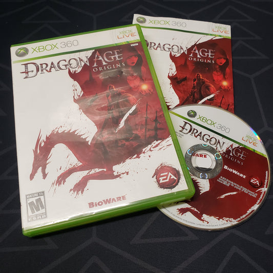 Image shows the case, manual and disc for the video game Dragon Age: Origins for Xbox 360