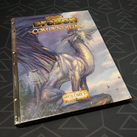 Image shows the front cover of the Dragon Compendium: Volume 1 roleplaying game book