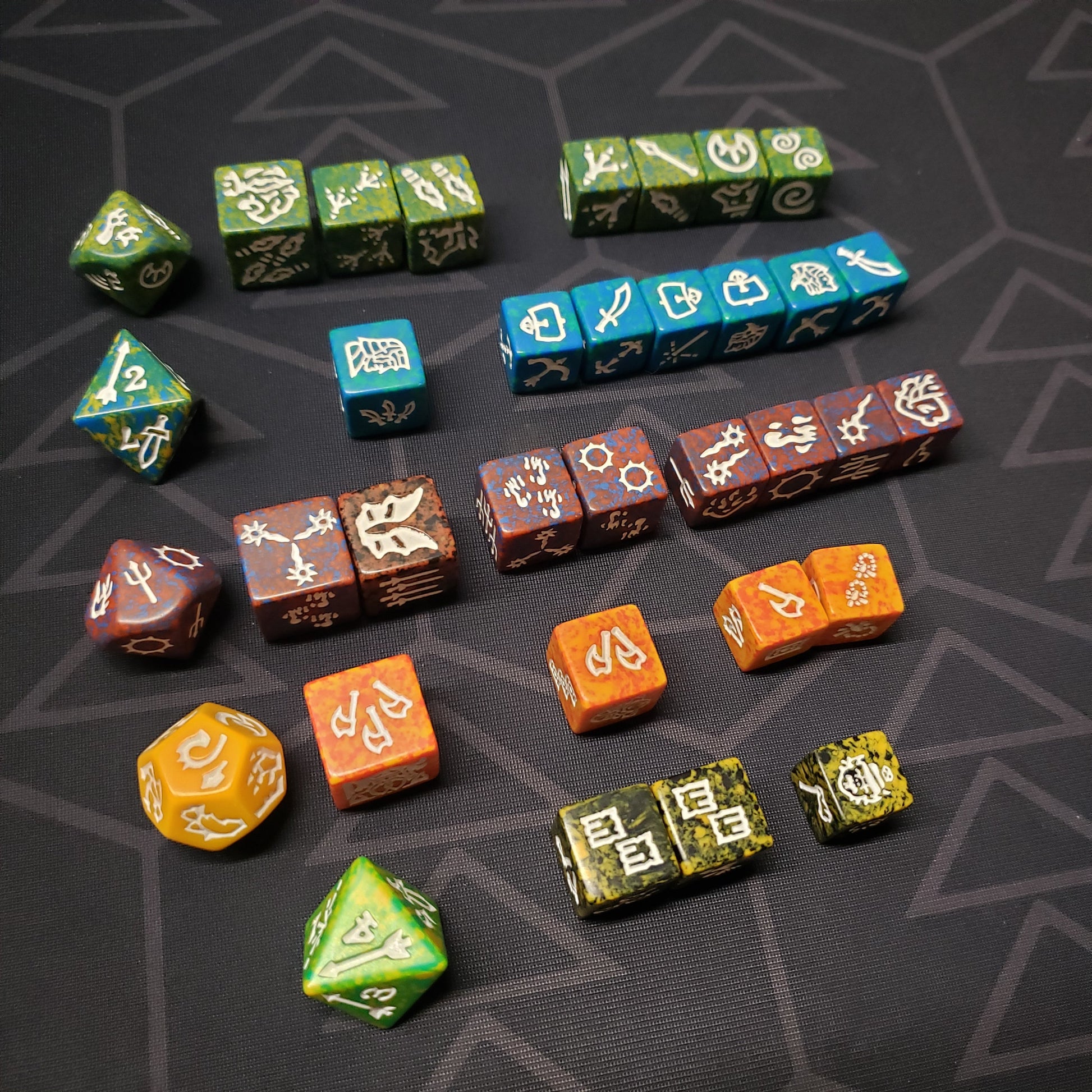 Image shows a bulk lot of 34 dice from the TSR Dragon Dice line