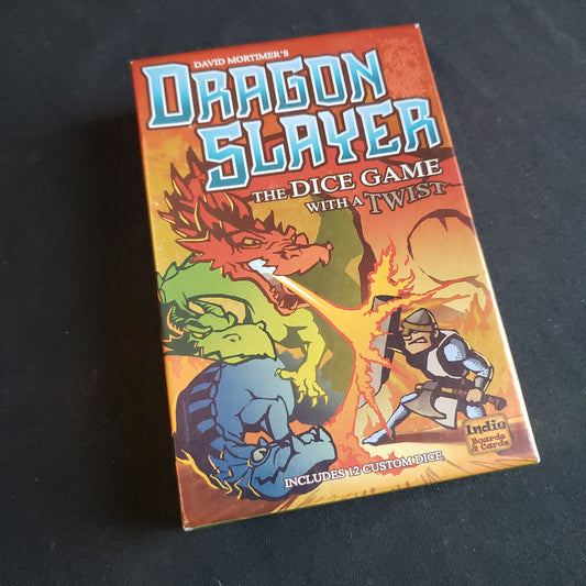 Image shows the front cover of the box of the Dragon Slayer dice game