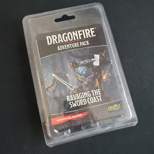 Image shows the front of the package for the Ravaging The Sword Coast Adventure Pack for the Dragonfire card game