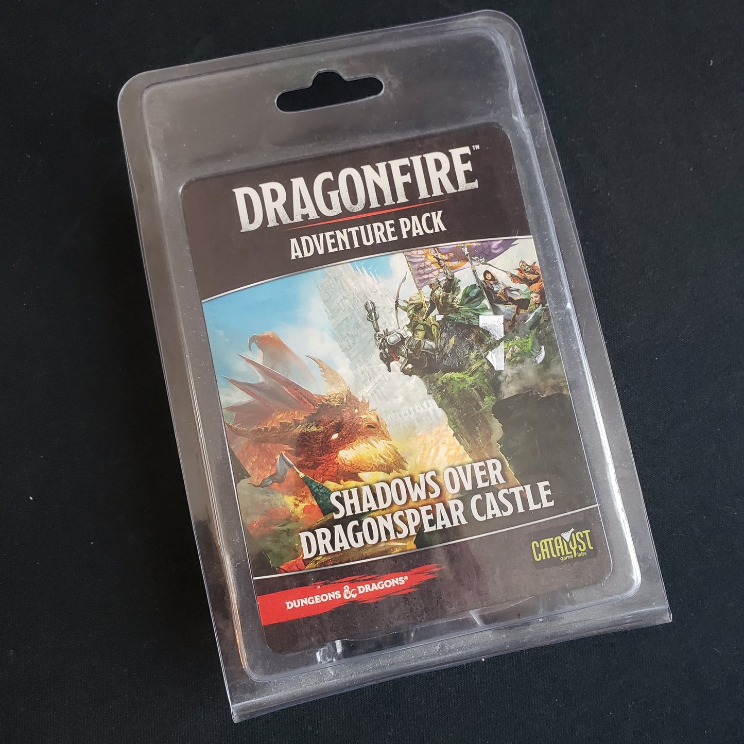 Image shows the front of the package for the Shadows Over Dragonspear Castle Adventure Pack for the Dragonfire card game