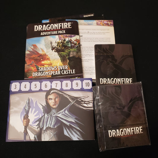 Image shows the cards & components for the Shadows Over Dragonspear Castle Adventure Pack for the Dragonfire card game