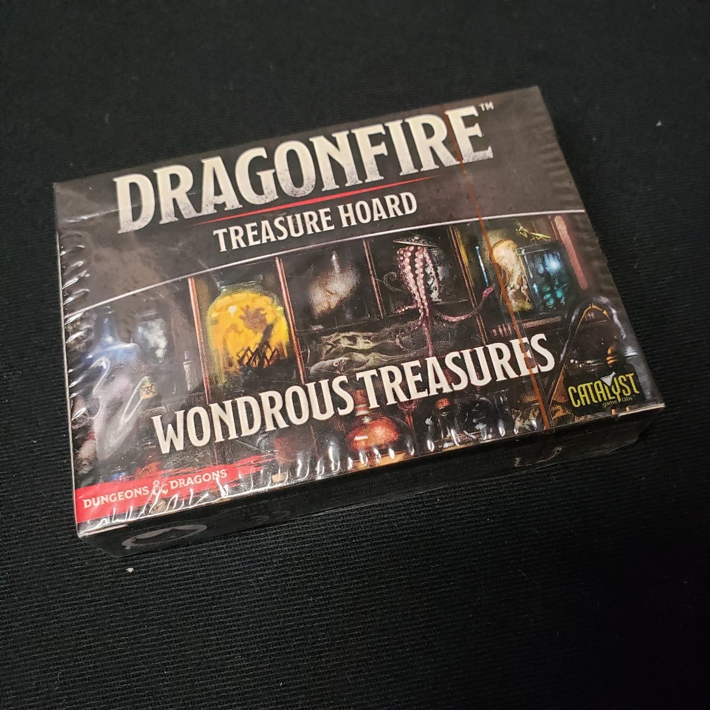 Image shows the front of the box for the Wonderous Treasures Expansion for the Dragonfire board game