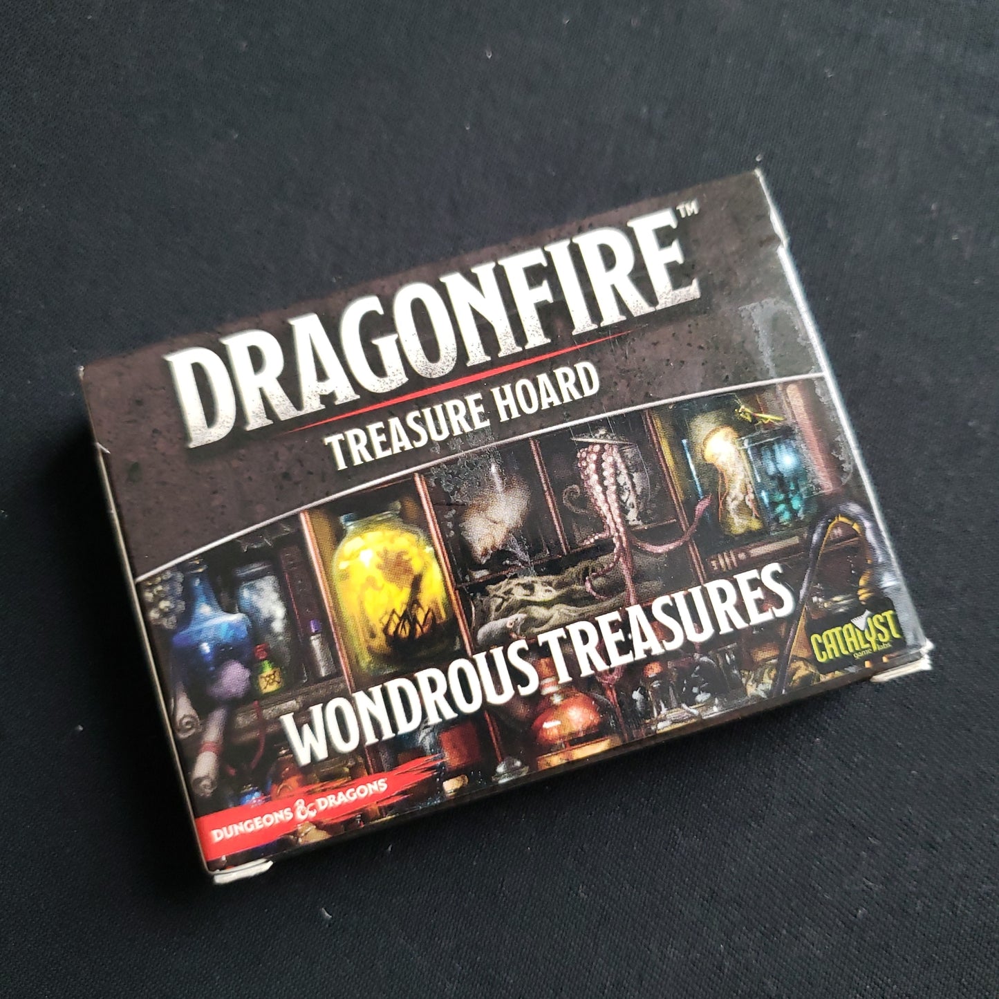 Image shows the front of the box for the Wonderous Treasures Expansion for the Dragonfire board game