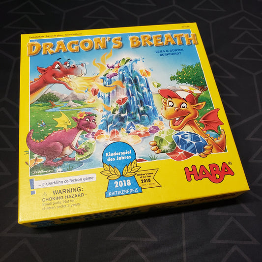 Image shows the front cover of the box for the Dragon's Breath board game