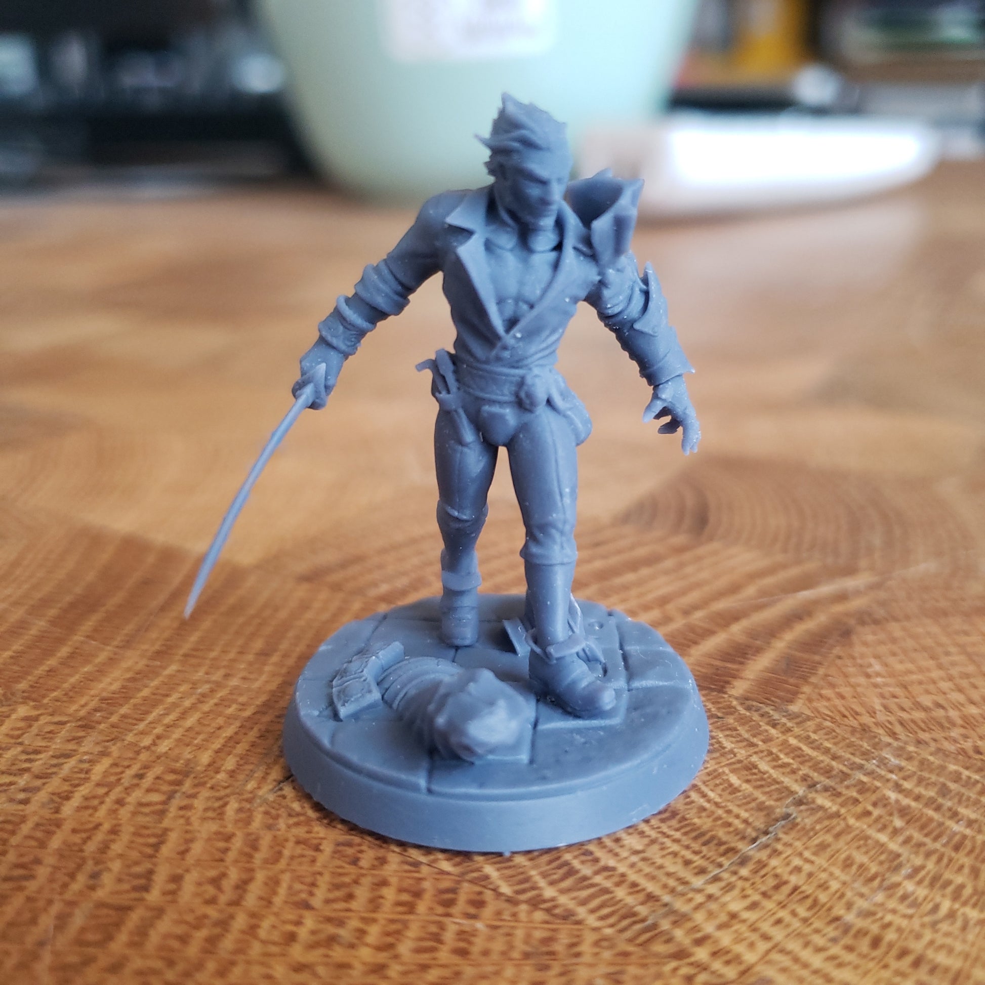 Image shows an example of a 3D printed human rogue gaming miniature printed in-house at All Systems Go