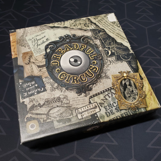 Image shows the front cover of the box of the Dreadful Circus board game