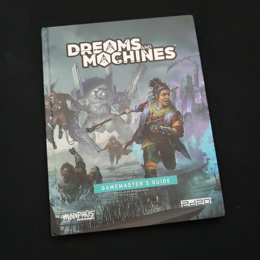 Image shows the front cover of the Gamemaster's Guide book for the Dreams and Machines roleplaying game