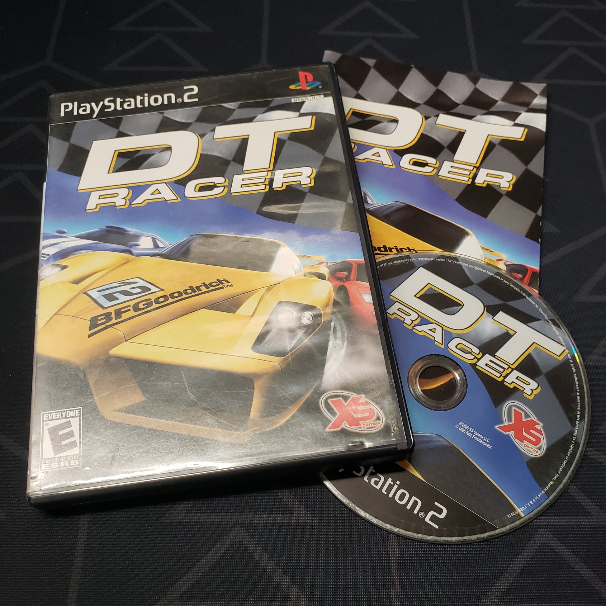 Image shows the case, manual and disc for the video game DT Racer for Playstation 2