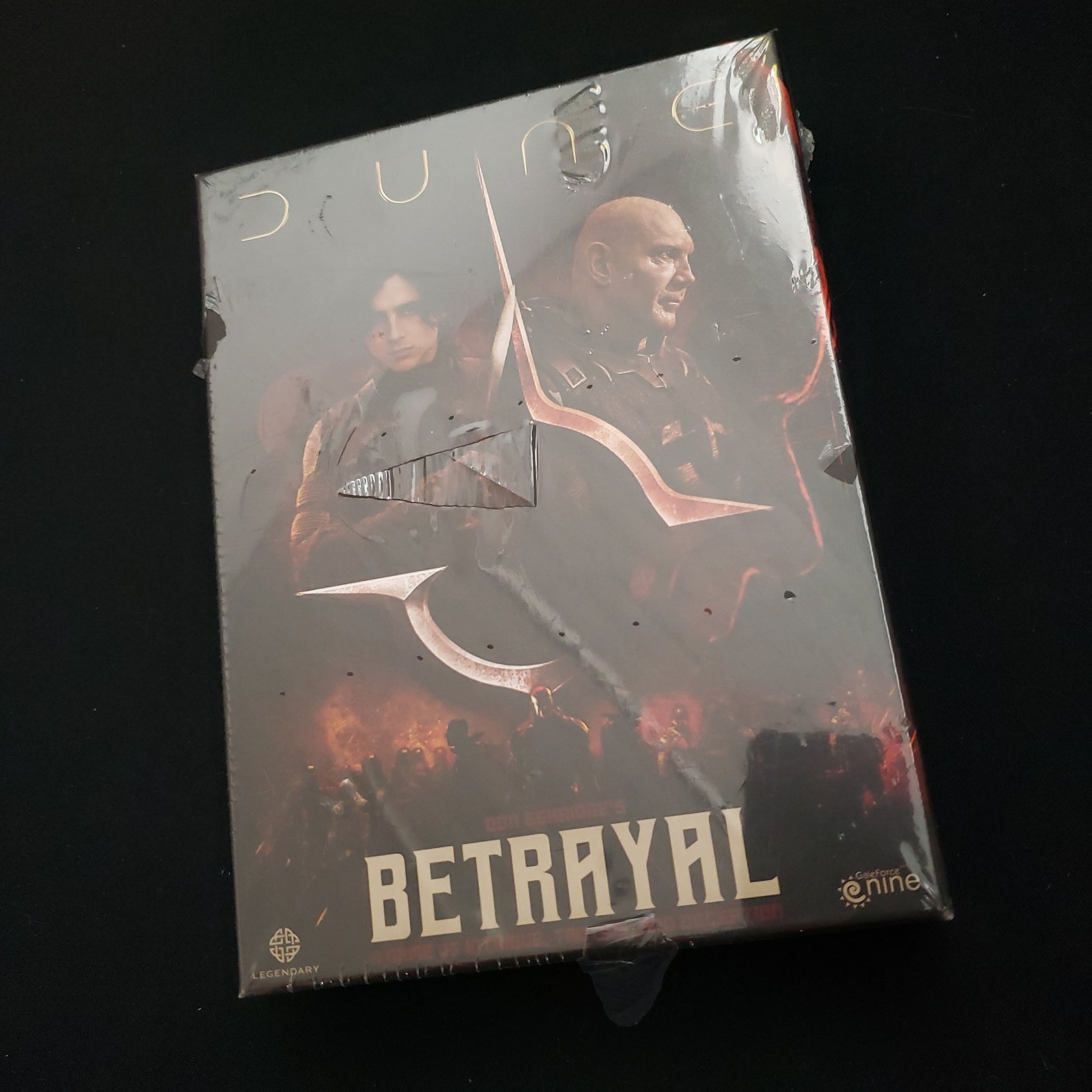 Image shows the front cover of the box of the Dune: Betrayal card game