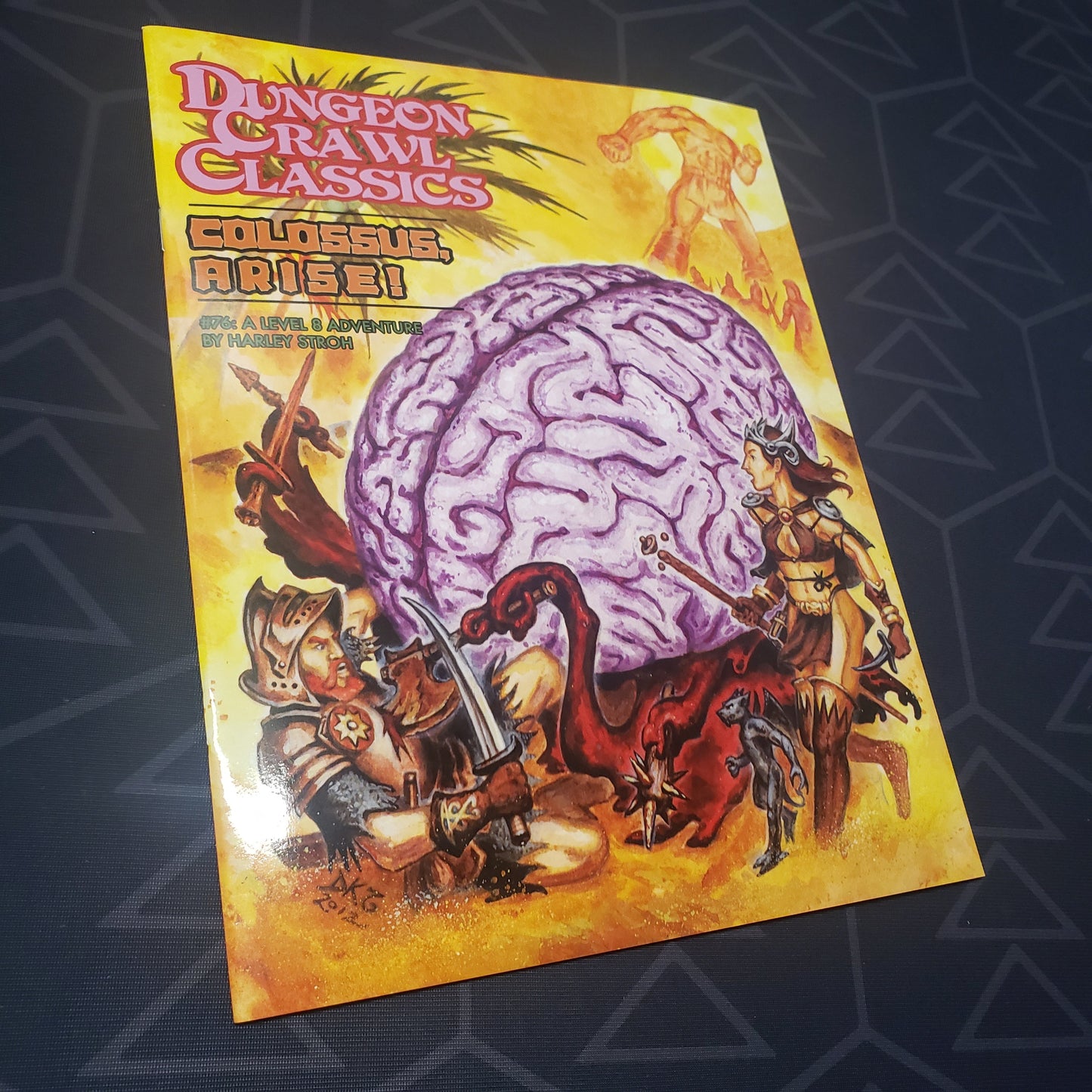 Image shows the front cover of the Colossus, Arise! book for the roleplaying game Dungeon Crawl Classics