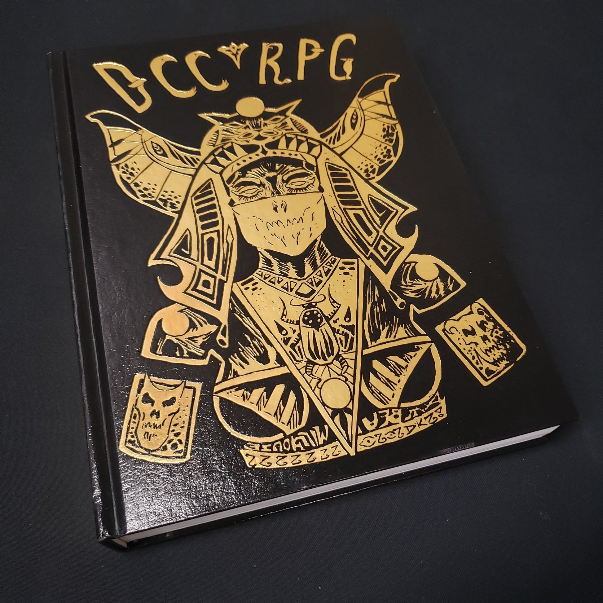 Image shows the Egyptian Lich cover variant of the core rulebook for the roleplaying game Dungeon Crawl Classics