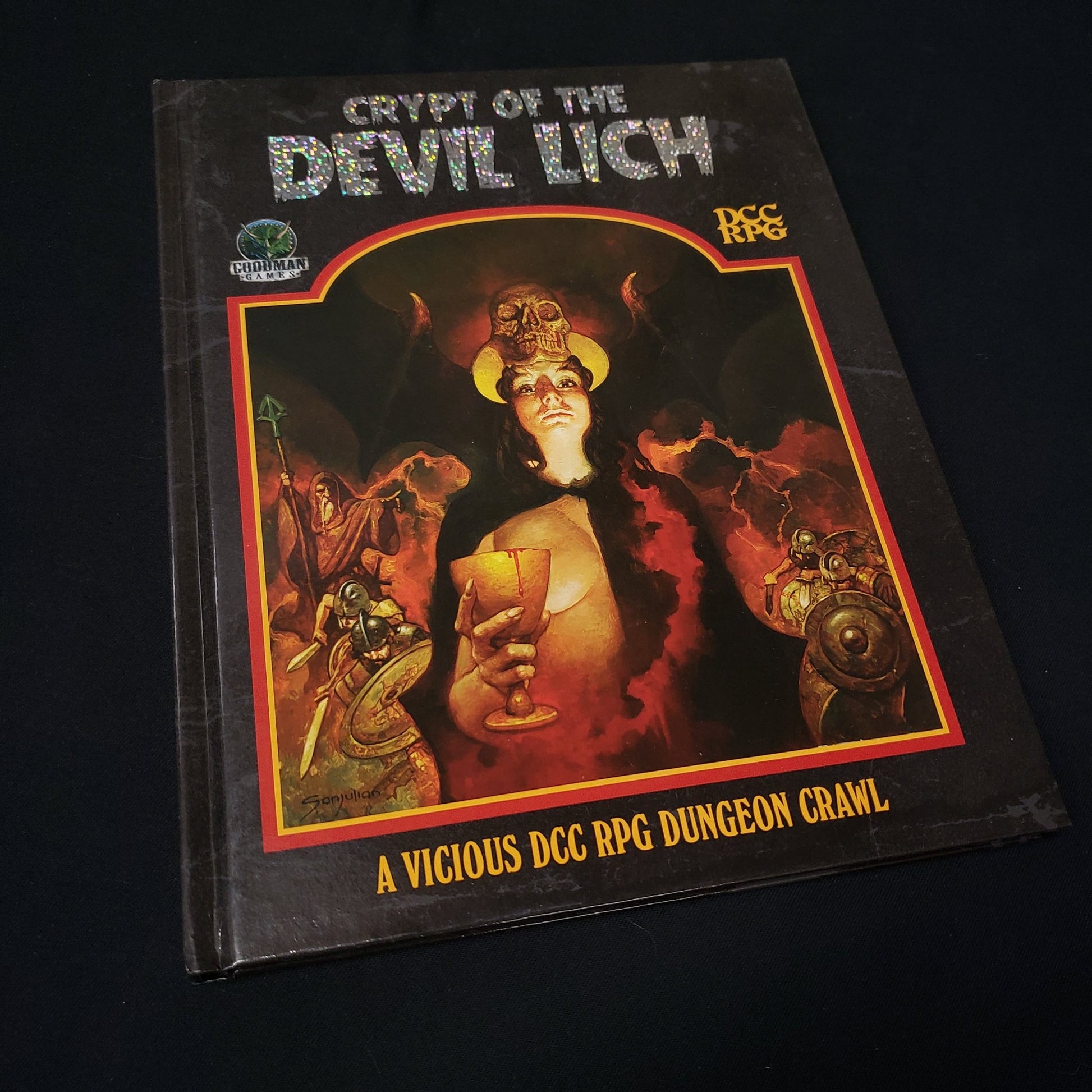 Image shows the Sanjulian art cover of the Crypt of the Devil Lich book for the roleplaying game Dungeon Crawl Classics